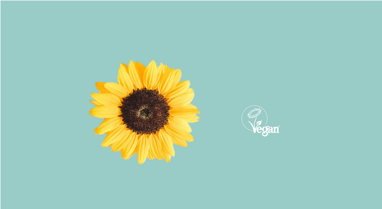 een zonnebloem en het Vegan Keurmerk
